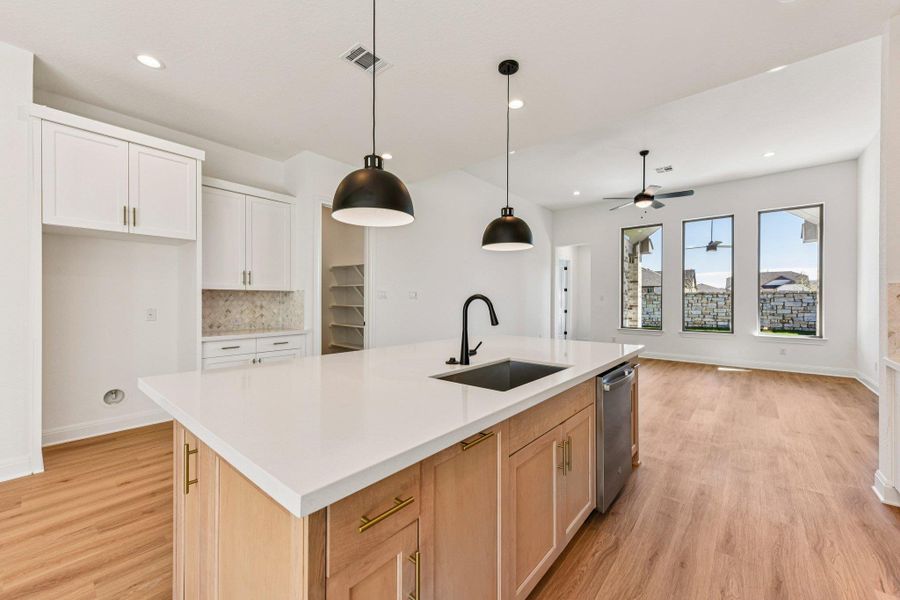 Furnished interior view inside a new home in 6 Creeks, Kyle (Image 10).