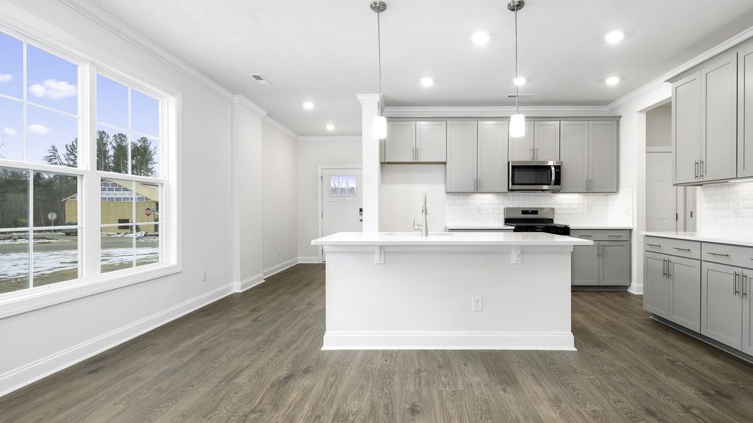 Furnished interior view inside a new home in The Meadows at Kinsley, Jamestown (Image 6).