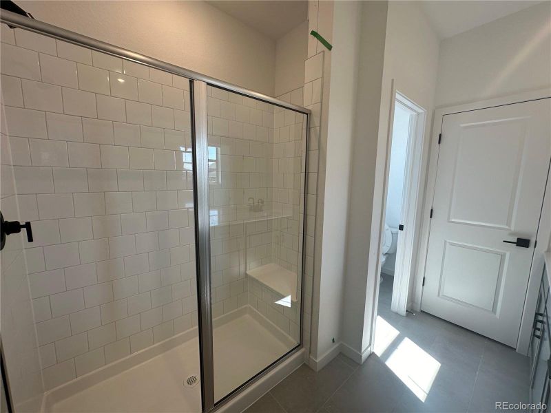 Primary bathroom with shower bench