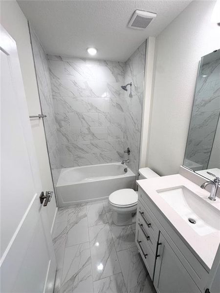 Furnished interior view inside a new home in Grasslands West, Lakeland (Image 13).