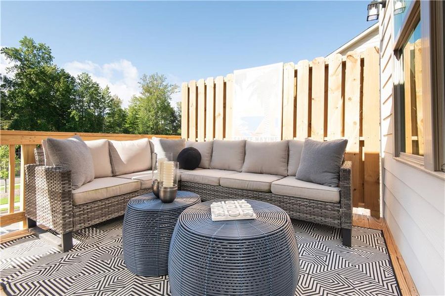 Exterior details and patio area of a home in Towns at Enclave, Lawrenceville (Image 2). Exterior details and patio area of a home in Towns at Enclave, Lawrenceville (Image 2).