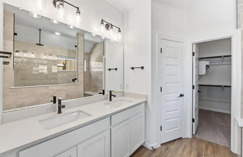 Furnished interior view inside a new home in West Cypress Hills, Spicewood (Image 12).