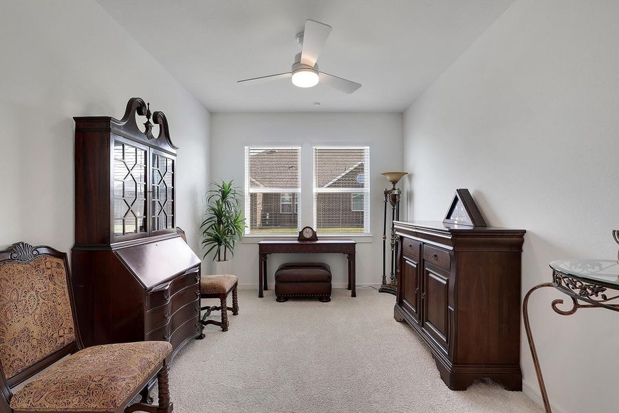 Elegant study space or potential for flex sitting area.