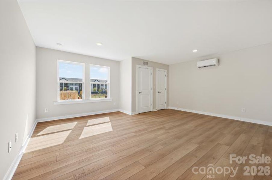 Spacious, unfurnished interior of a new home in North Creek Village - Townhomes, Huntersville (Image 19).