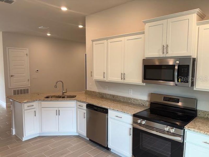 Furnished interior view inside a new home in Juliette Falls, Dunnellon (Image 4).