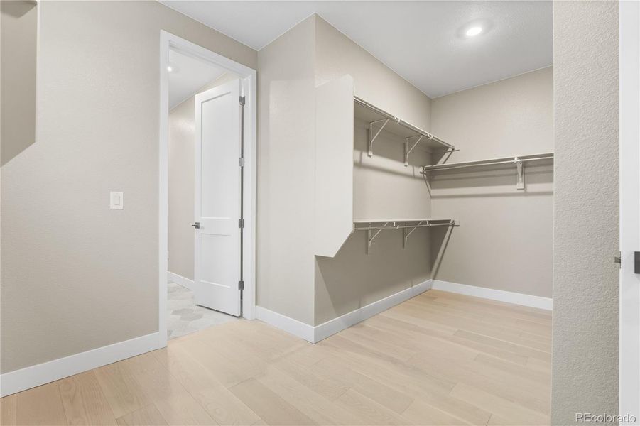 Spacious, unfurnished interior of a new home in Autograph at Lyric, Lone Tree (Image 21).