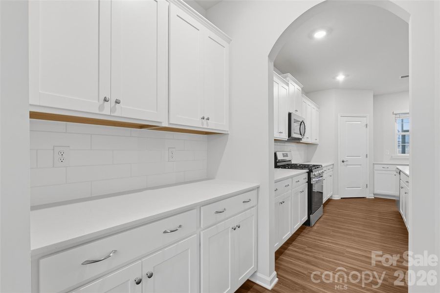 Furnished interior view inside a new home in Redhawk: Enclave, Belmont (Image 11).