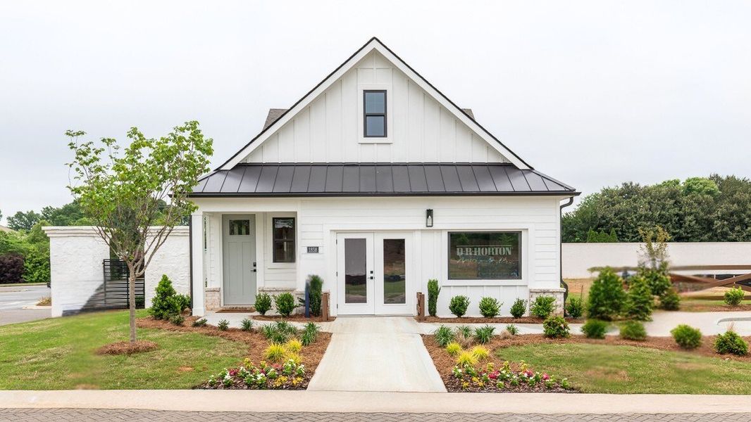 Front exterior of a new home in The Village at Sandy Plains, Marietta, GA, highlighting curb appeal (Image 1). Front exterior of a new home in The Village at Sandy Plains, Marietta, GA, highlighting curb appeal (Image 1).
