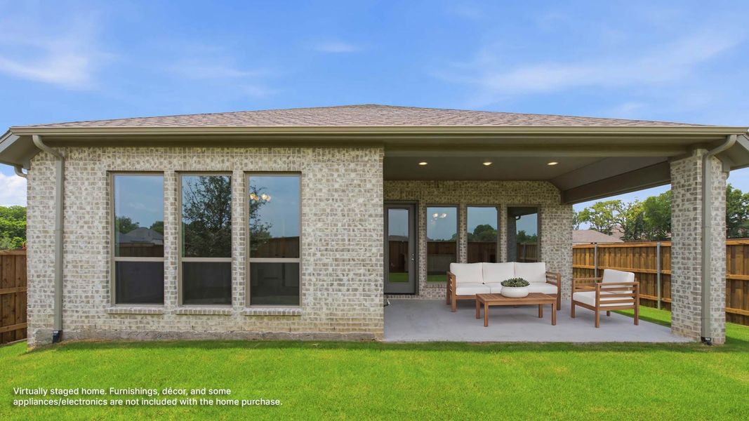 Exterior details and patio area of a home in Trinity Falls, McKinney (Image 3). Exterior details and patio area of a home in Trinity Falls, McKinney (Image 3).