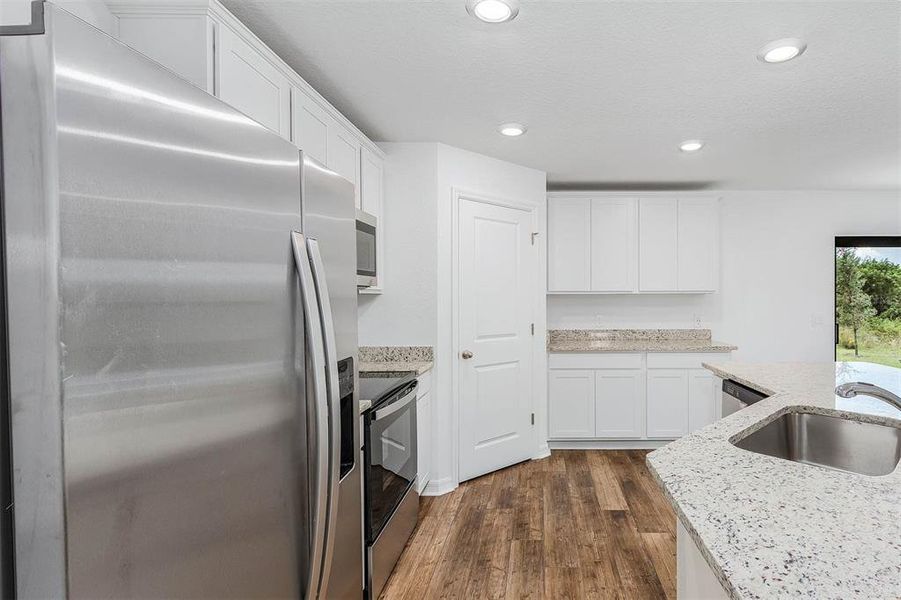 Furnished interior view inside a new home in , Port Charlotte (Image 6).