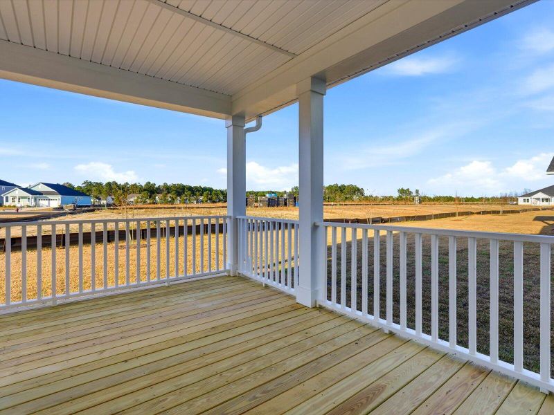 Exterior details and patio area of a home in The Coves at Lakes of Cane Bay, Summerville (Image 29). Exterior details and patio area of a home in The Coves at Lakes of Cane Bay, Summerville (Image 29).