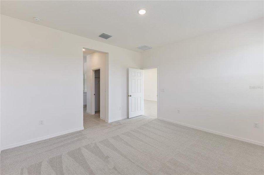 Spacious, unfurnished interior of a new home in Highfield at Twisted Oaks, Wildwood (Image 11).