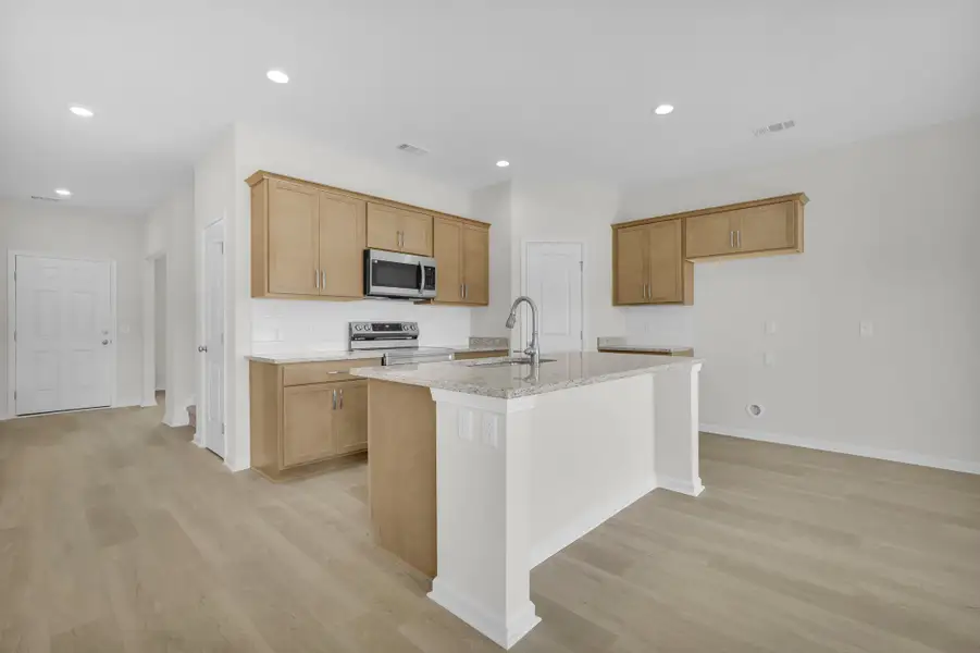 Representative furnished interior of a home built from the The Magnolia by Smith Family Homes in Sweetwater, Brunswick (Image 7).