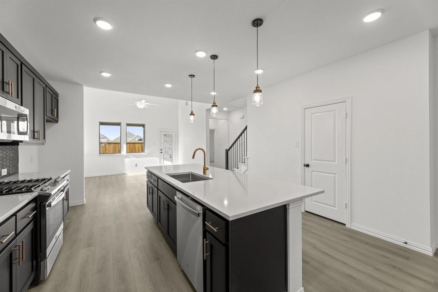 Open Kitchen-Living Room Representative Photo featuring the Noir Collection