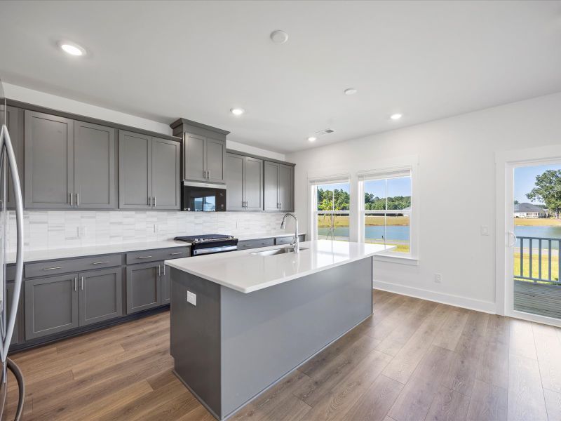 Furnished interior view inside a new home in The Coves at Lakes of Cane Bay, Summerville (Image 3).