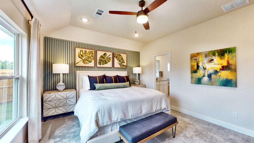 A bedroom with a large bed. A bedroom with a large bed.