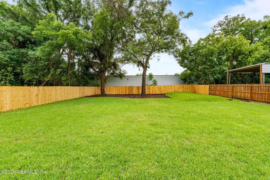 Exterior details and patio area of a home in , Jacksonville (Image 4). Exterior details and patio area of a home in , Jacksonville (Image 4).