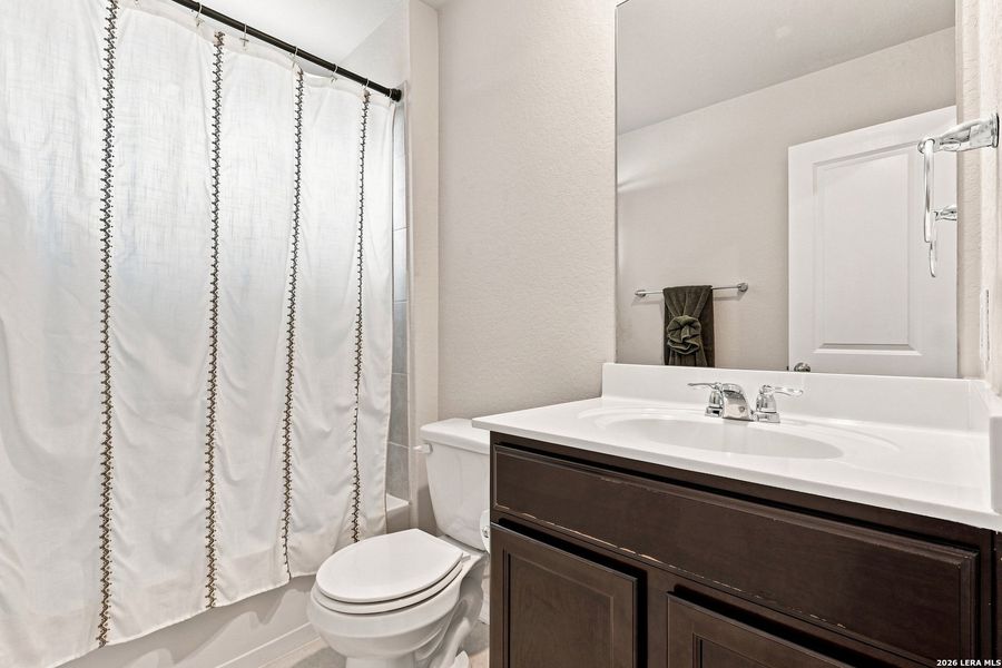 Furnished interior view inside a new home in Redbird Ranch, San Antonio (Image 15).