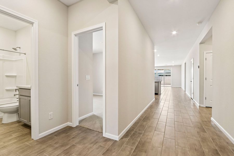 A bathroom with white walls.