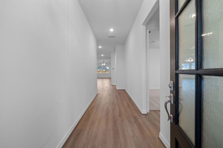 Home entry. Sample product photo. Actual exterior and interior selections may vary by homesite. Photo may be virtually staged.