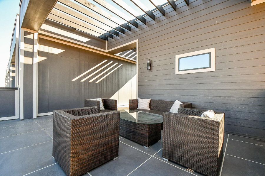 Exterior details and patio area of a home in , Houston (Image 24).