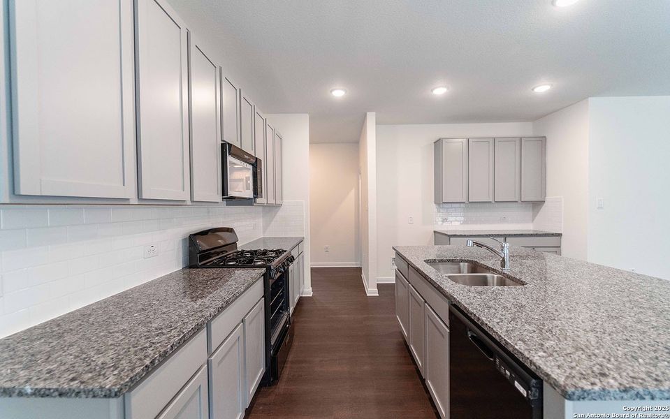 Furnished interior view inside a new home in Hickory Ridge, Elmendorf (Image 4).