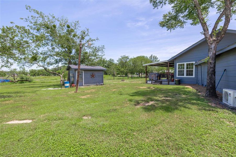 Exterior details and patio area of a home in , Brownwood (Image 21).