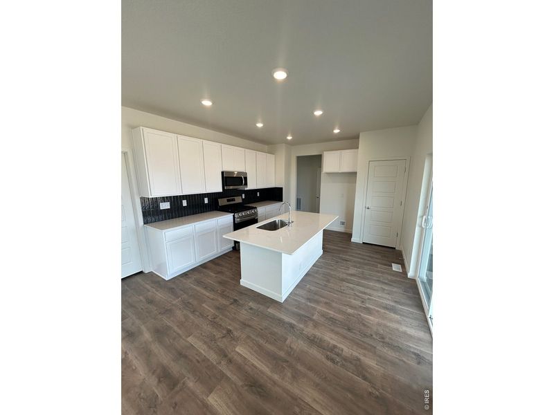 Furnished interior view inside a new home in Hudson Hills, Hudson (Image 7).