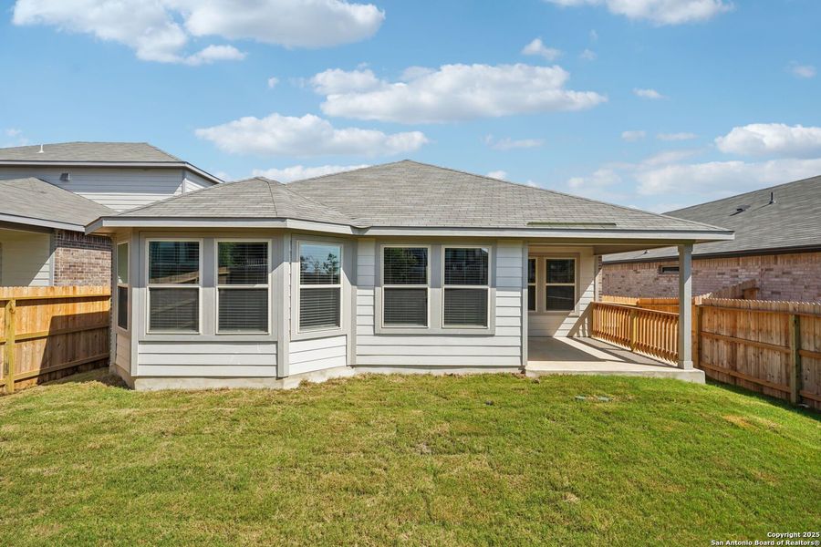 Front exterior of a new home in Comanche Ridge, San Antonio, TX, highlighting curb appeal (Image 22).
