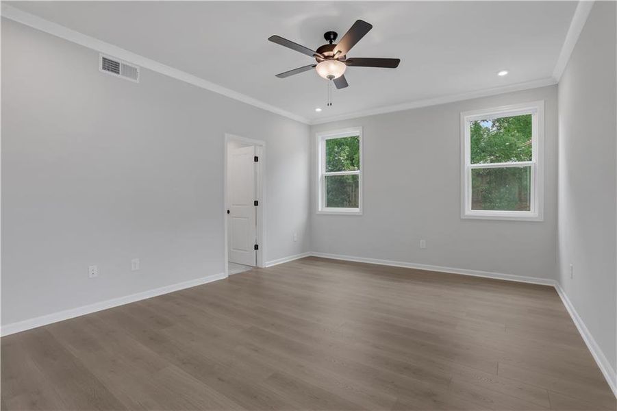 Spacious, unfurnished interior of a new home in The Paddocks at Doc Hughes, Buford (Image 45).