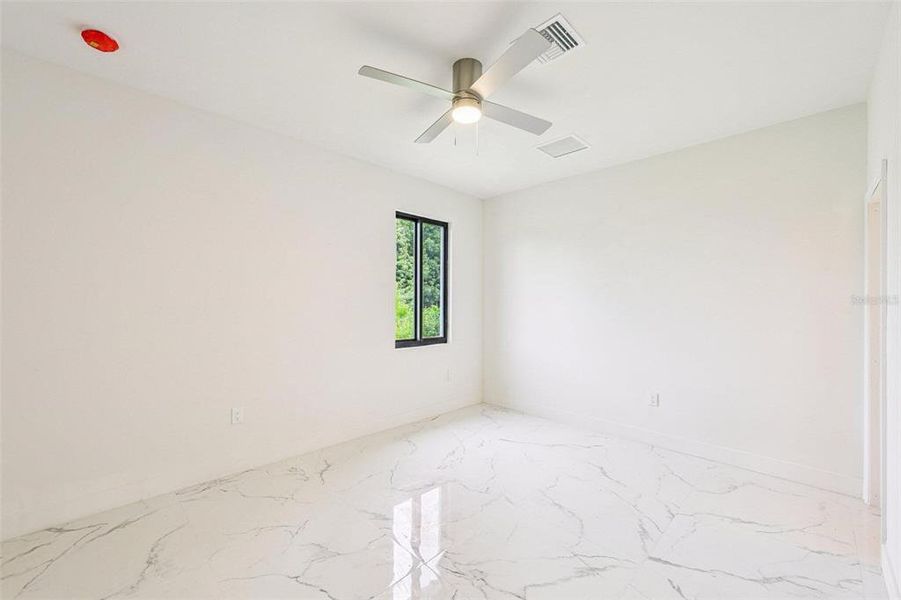 Spacious, unfurnished interior of a new home in , Port Charlotte (Image 16).