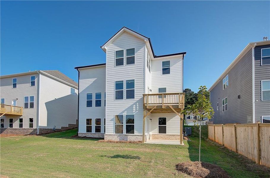 Front exterior of a new home in Cooper Park, McDonough, GA, highlighting curb appeal (Image 13).