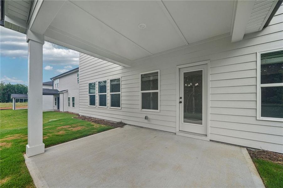 Exterior details and patio area of a home in Vines at Mill Creek - Estate Series, Braselton (Image 25).