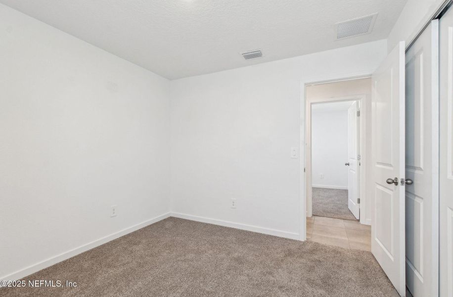 Spacious, unfurnished interior of a new home in Flagler Village - Classic Series, Palm Coast (Image 32).