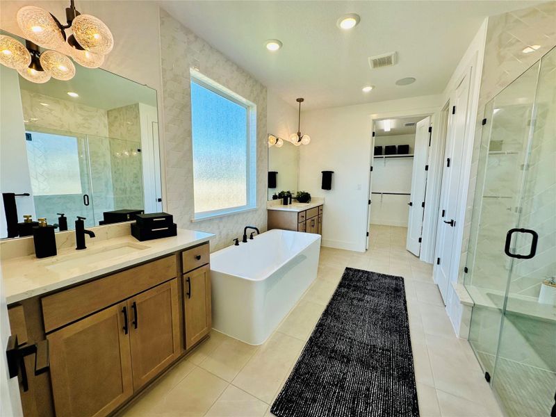 Primary Bath retreat with dual vanities, garden tub & walk-in shower Primary Bath retreat with dual vanities, garden tub & walk-in shower