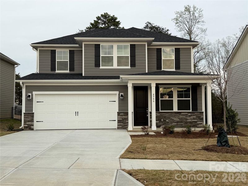 Front exterior of a new home in , Denver, NC, highlighting curb appeal (Image 13).