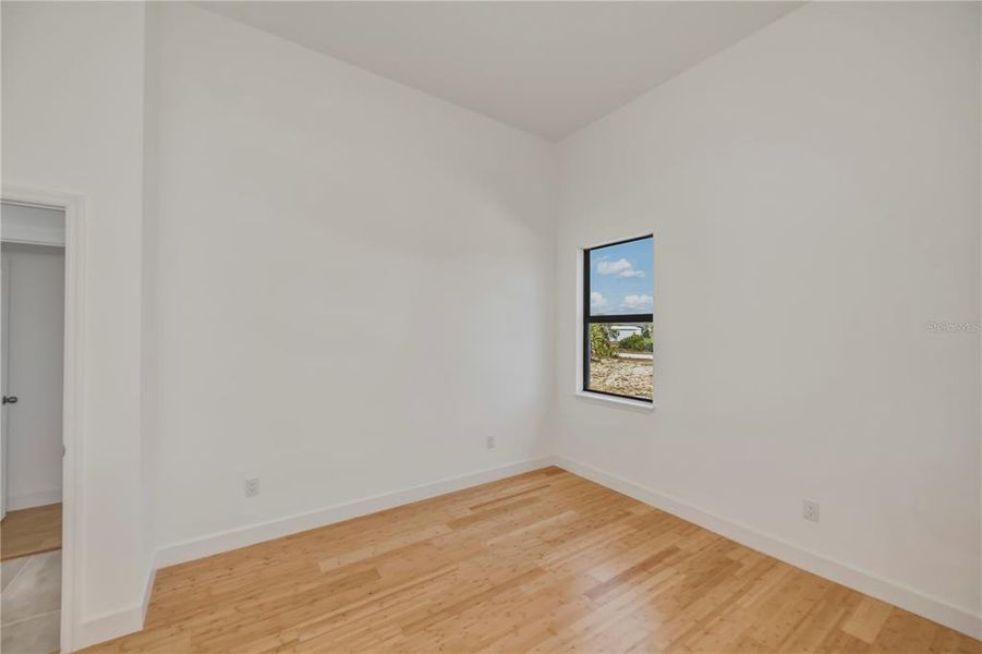 Spacious, unfurnished interior of a new home in , Port Charlotte (Image 24).