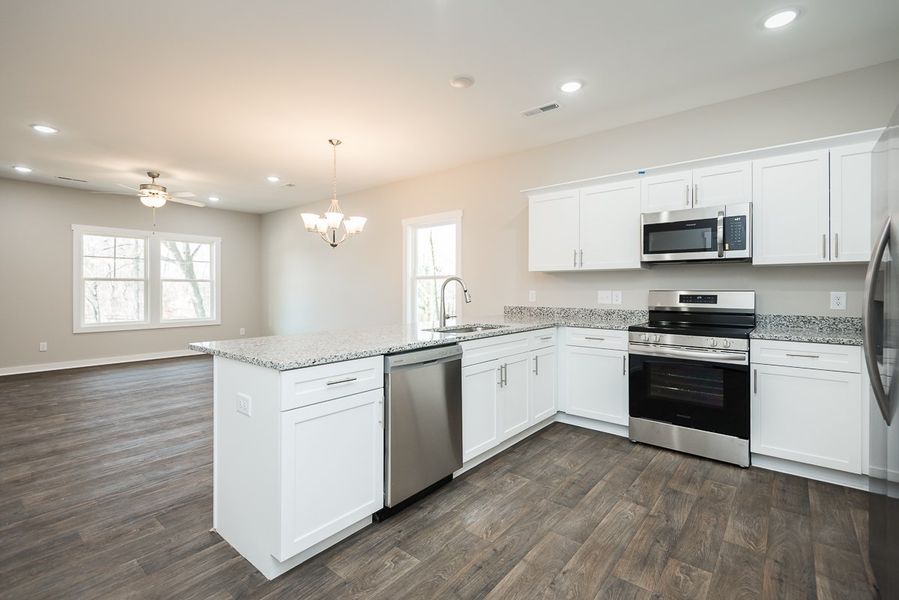 Representative furnished interior of a home built from the TH 1425 END by Foundation Home Builders LLC in Stokesburg Road Townhomes, Walnut Cove (Image 6).