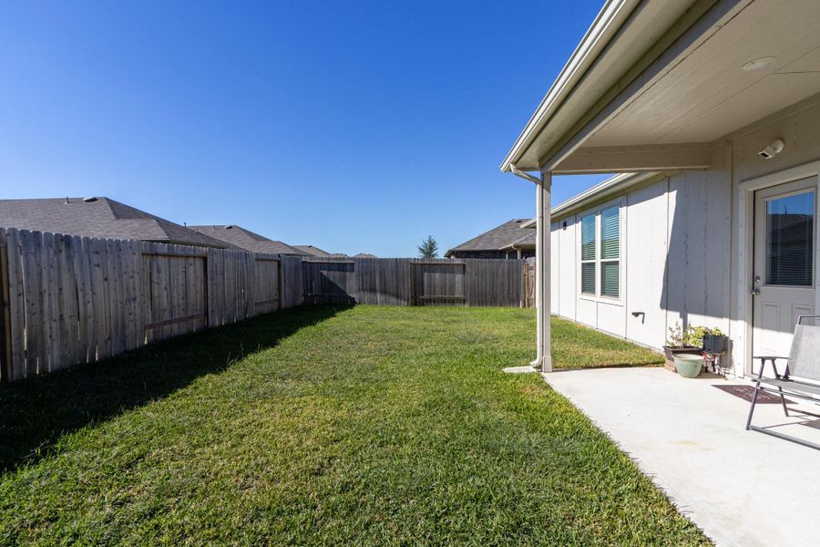Exterior details and patio area of a home in Mustang Ridge, Alvin (Image 28). Exterior details and patio area of a home in Mustang Ridge, Alvin (Image 28).