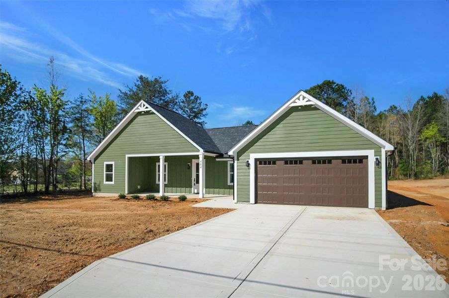 Front exterior of a new home in , Cherryville, NC, highlighting curb appeal (Image 25). Front exterior of a new home in , Cherryville, NC, highlighting curb appeal (Image 25).