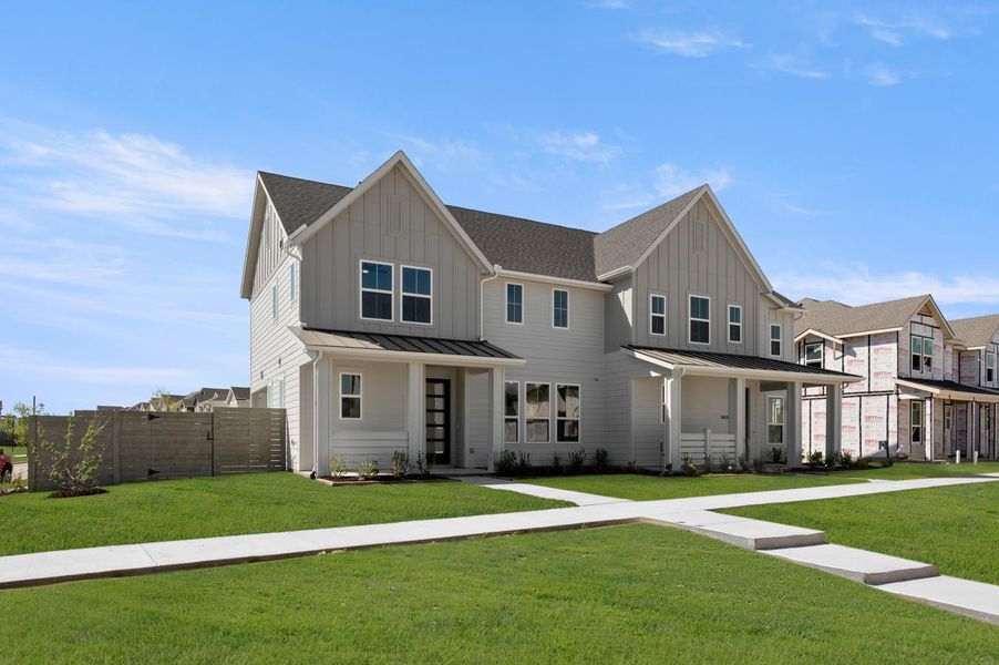 Front exterior of a new home in The Retreat at Harvest, Argyle, TX, highlighting curb appeal (Image 2). Front exterior of a new home in The Retreat at Harvest, Argyle, TX, highlighting curb appeal (Image 2).