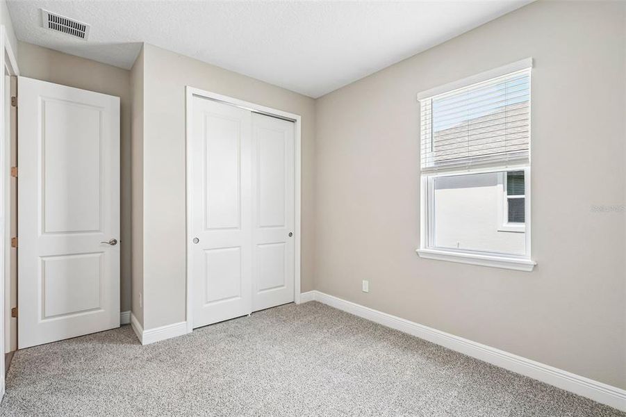 Spacious, unfurnished interior of a new home in Legends Preserve - Signature Series, Daytona Beach (Image 32).