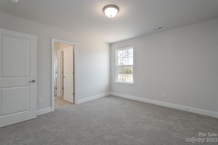Representative unfurnished interior of a home built from the 3119 by Adams Homes in Hidden Pines, Cameron (Image 26).