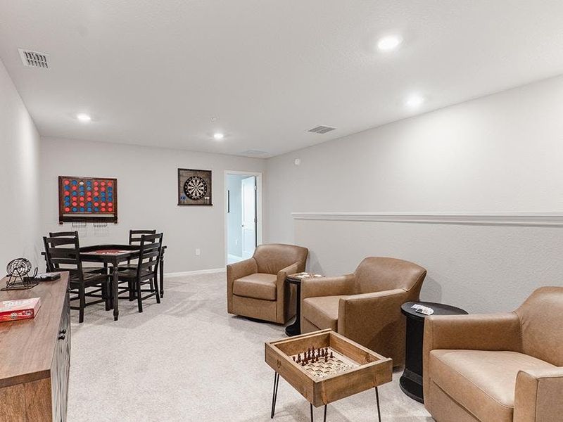 Upstairs, a large loft provides desirable flex-use space - Birch townhome by Highland Homes Upstairs, a large loft provides desirable flex-use space - Birch townhome by Highland Homes