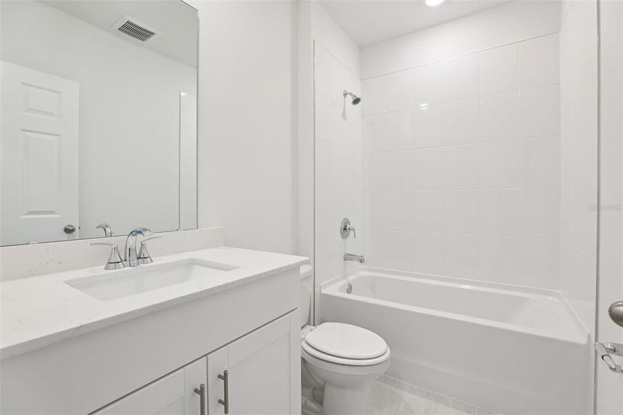 Furnished interior view inside a new home in Bradbury Creek - Signature Series, Haines City (Image 13).