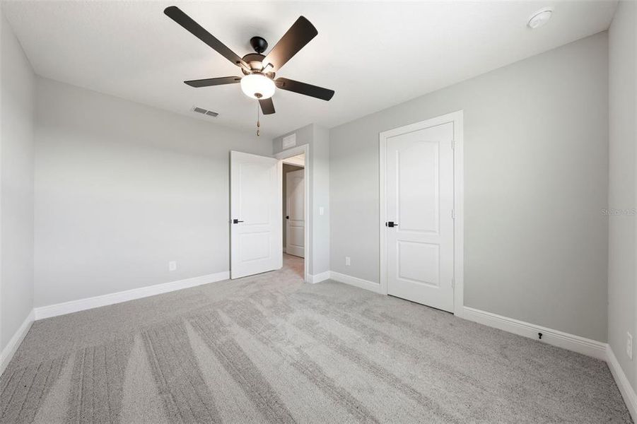 Spacious, unfurnished interior of a new home in Gum Lake Preserve, Lake Alfred (Image 56).