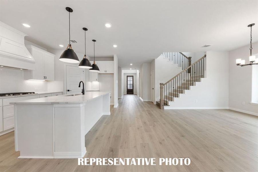 Featuring a stunning entry that leads directly to your light filled, open concept living area, our 4205 plan offers thoughtful design elements paired with luxurious finishes to create the perfect dream home! REPRESENTATIVE PHOTO Featuring a stunning entry that leads directly to your light filled, open concept living area, our 4205 plan offers thoughtful design elements paired with luxurious finishes to create the perfect dream home! REPRESENTATIVE PHOTO