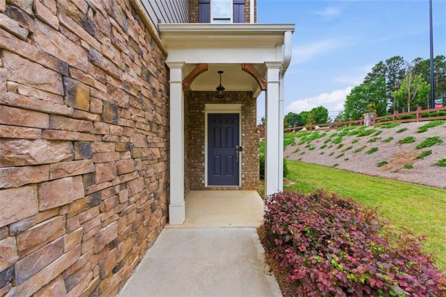 Exterior details and patio area of a home in Park Center Pointe, Mableton (Image 3).