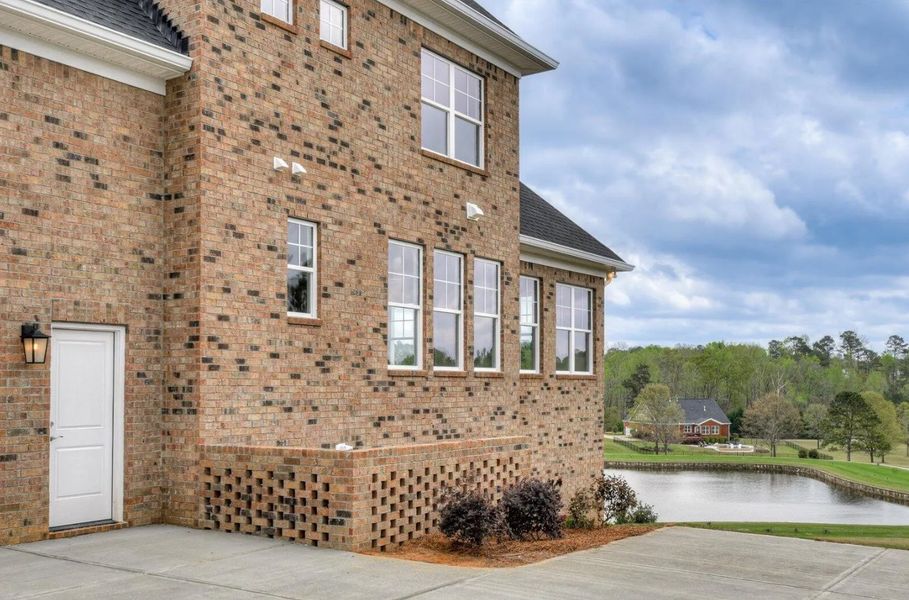 Front exterior of a new home in Mount Vintage, North Augusta, SC, highlighting curb appeal (Image 24).