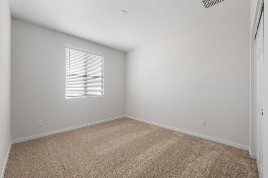 Spacious, unfurnished interior of a new home in Blossom Rock, Apache Junction (Image 28).